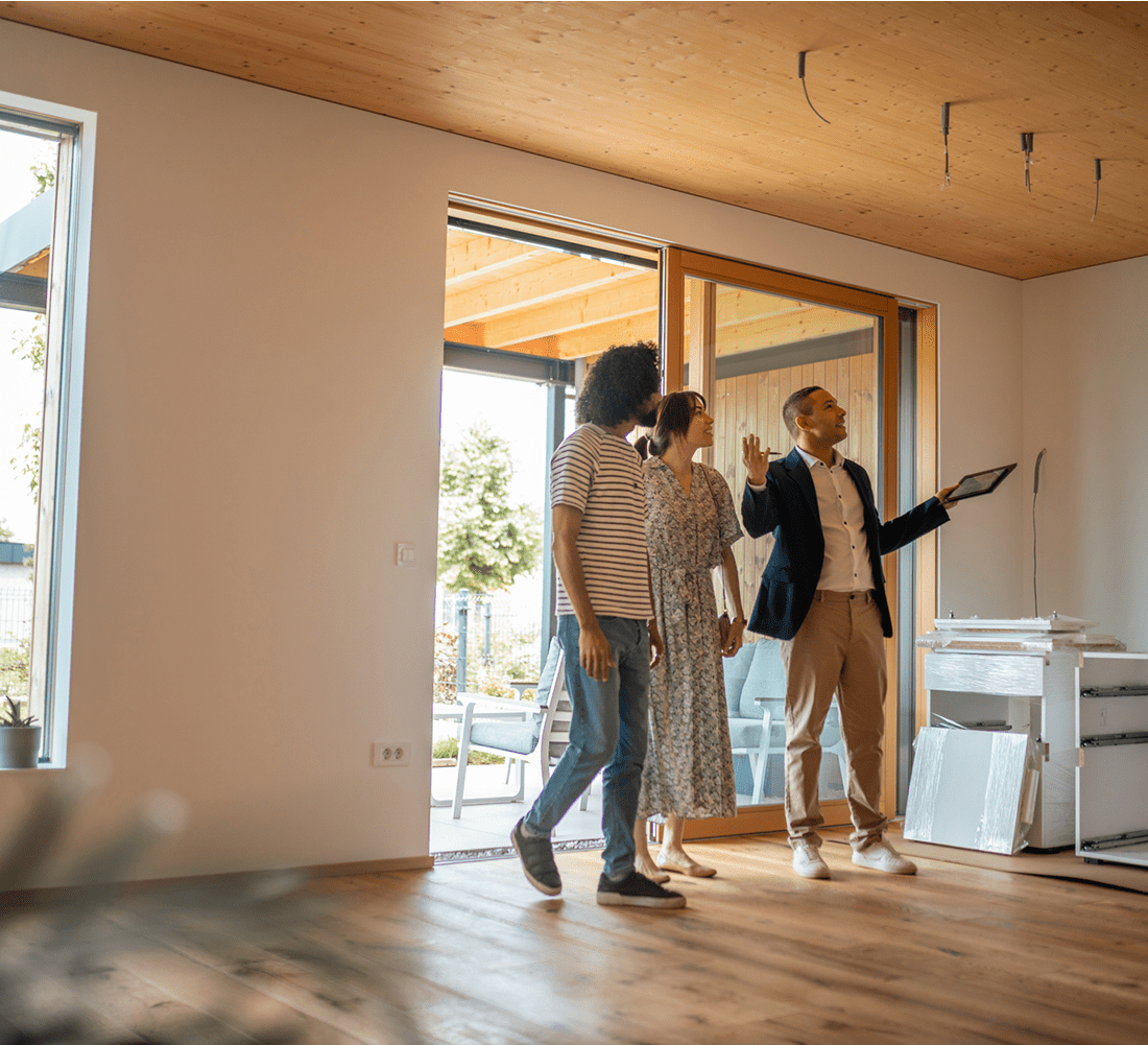 Real estate agent showing modern house